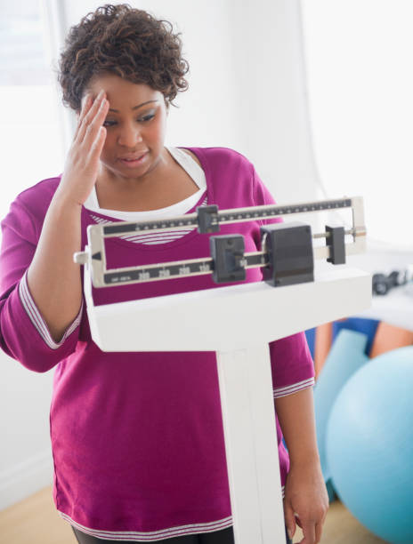 reducción de estómago riesgos mujer pesaje